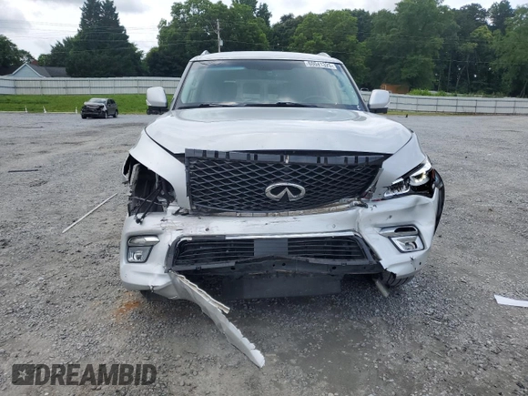 2016 Infiniti QX80 with VIN JN8AZ2NF5G9610490, listed as a Copart auction lot 60041325 with 131,253 mi miles and Salvage title. Bid and sale history available at DreamBid. Image 5.