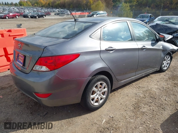 2014 Hyundai Accent GLS with VIN KMHCT4AE9EU614191, listed as a IAAI auction lot 37899279 with 144,247 mi miles. Bid and sale history available at carsss.com. Image 4.