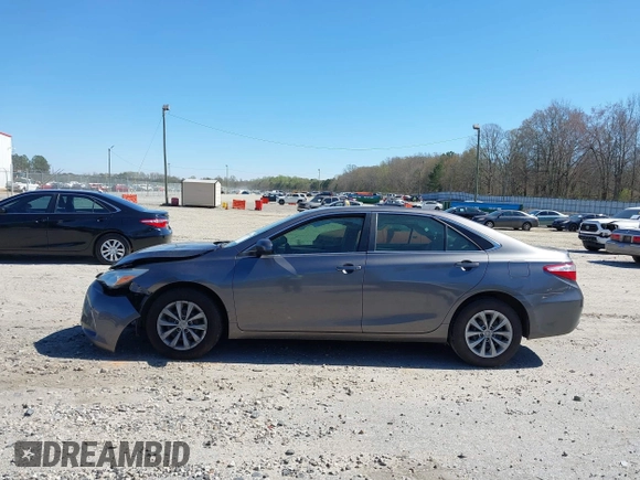 2015 Toyota Camry XLE z VIN 4T1BF1FK5FU092709, wystawiony jako IAAI lot #41859995 z przebiegiem 167 819 mil mil oraz . Historia ofert i sprzedaży dostępna na DreamBid. Obrazek 13.