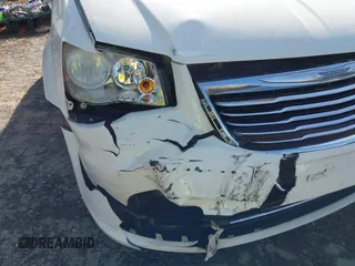 2012 Chrysler Town & Country Touring L with VIN 2C4RC1CGXCR163522, listed as a IAAI auction lot 41923296 with 218,342 mi miles and . Bid and sale history available at DreamBid. Image 6.