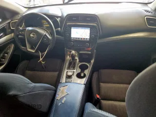 2016 Nissan Maxima Platinum z VIN 1N4AA6AP7GC440845, wystawiony jako Copart lot #60260945 z przebiegiem 129 669 mil mil oraz Szkoda całkowita • Salvage title. Historia ofert i sprzedaży dostępna na DreamBid. Obrazek 8.