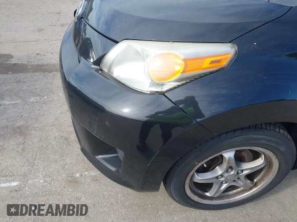 2009 Scion xD with VIN JTKKU10409J041654, listed as a IAAI auction lot 42036558 with 122,661 mi miles. Bid and sale history available at carsss.com. Image 12.