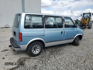 1989 GMC Safari z VIN 1GKDM15Z4KB517560, wystawiony jako Copart lot #51775615 z przebiegiem 152 882 mil mil oraz Szkody całkowita. Historia ofert i sprzedaży dostępna na DreamBid. Obrazek 3.