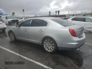 2012 Lincoln MKS with VIN 1LNHL9DR5CG804793, listed as a Copart auction lot 48966795 with 111,097 mi miles and Clean Title. Bid and sale history available at DreamBid. Image 2.