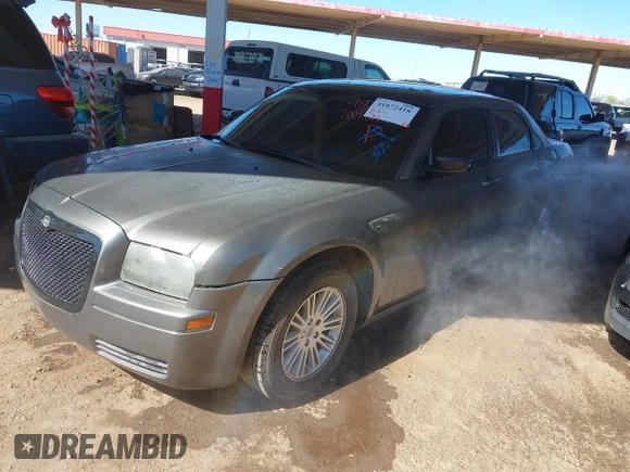 2009 Chrysler 300 LX with VIN 2C3KA43D79H574863, listed as a IAAI auction lot 41872418 with 1 mi miles. Bid and sale history available at carsss.com. Image 2.