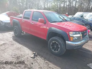 2012 GMC Canyon SLE1 with VIN 1GTH6MFE9C8107145, listed as a IAAI auction lot 41440495 with 218,557 mi miles. Bid and sale history available at carsss.com. Image 1.