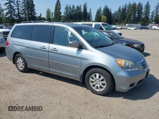 2009 Honda Odyssey EX-L with VIN 5FNRL38779B013943, listed as a IAAI auction lot 42119422 with 147,285 mi miles. Bid and sale history available at carsss.com. Image 1.