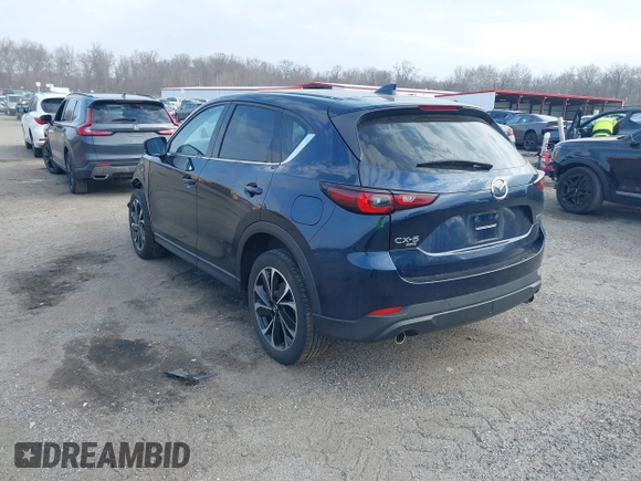 2022 Mazda CX-5 2.5 S Premium Package with VIN JM3KFBDM4N1528813, listed as a IAAI auction lot 41695842 with 29,994 mi miles. Bid and sale history available at carsss.com. Image 3.