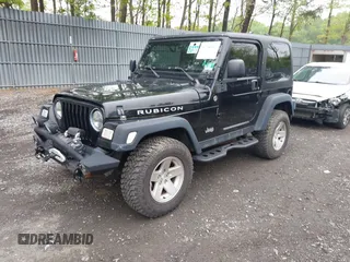 2006 Jeep Wrangler Rubicon z VIN 1J4FA69S76P749712, wystawiony jako IAAI lot #42240375 z przebiegiem 75 405 mil mil oraz . Historia ofert i sprzedaży dostępna na DreamBid. Obrazek 2.