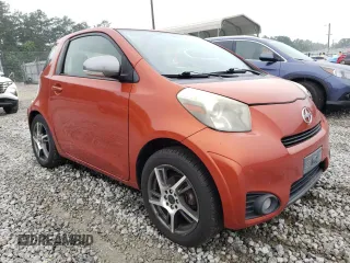 2012 Scion iQ with VIN JTNJJXB07CJ017816, listed as a Copart auction lot 59616355 with 141,384 mi miles and Salvage title. Bid and sale history available at DreamBid. Image 4.
