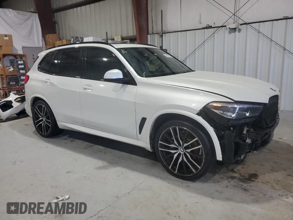2021 BMW X5 sDrive40i with VIN 5UXCR4C09M9F61659, listed as a Copart auction lot 58670335 with Not provided miles and Salvage title. Bid and sale history available at DreamBid. Image 4.
