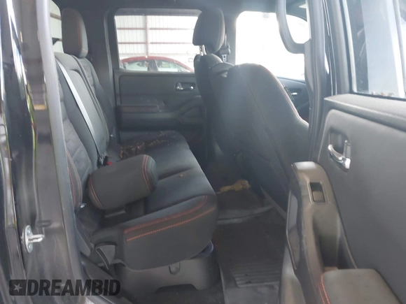 2023 Nissan Frontier SV with VIN 1N6ED1EK1PN634535, listed as a IAAI auction lot 42748147 with 32,304 mi miles and . Bid and sale history available at DreamBid. Image 8.