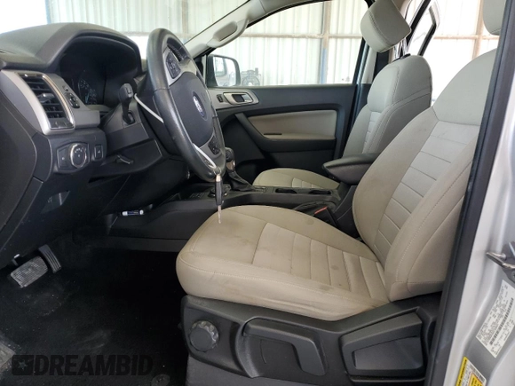 2019 Ford Ranger XL with VIN 1FTER4FH5KLA29401, listed as a Copart auction lot 49282355 with 98,143 mi miles and Salvage Title. Bid and sale history available at DreamBid. Image 7.