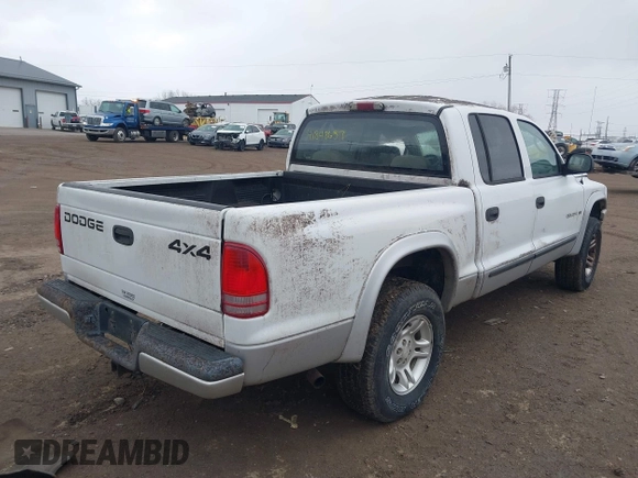 2002 Dodge Dakota SLT z VIN 1B7HG48N72S577296, wystawiony jako IAAI lot #41848637 z przebiegiem 133 777 mil mil oraz . Historia ofert i sprzedaży dostępna na DreamBid. Obrazek 12.