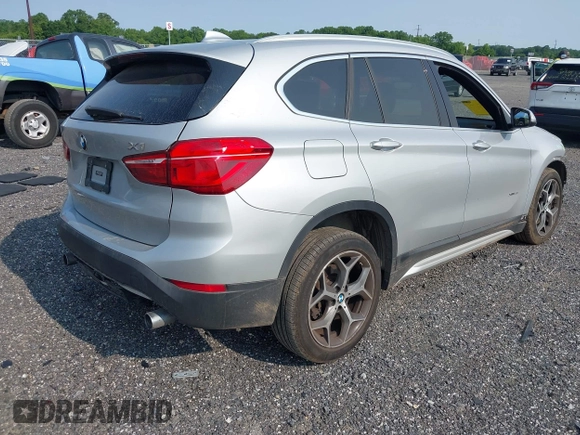 2018 BMW X1 xDrive28i with VIN WBXHT3C32J5K23486, listed as a IAAI auction lot 42387208 with 76,115 mi miles and . Bid and sale history available at DreamBid. Image 4.