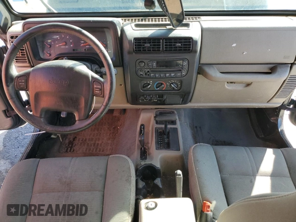 2003 Jeep Wrangler Sahara z VIN 1J4FA59SX3P302622, wystawiony jako Copart lot #52756105 z przebiegiem 181 900 mil mil oraz Szkoda całkowita • Salvage title. Historia ofert i sprzedaży dostępna na DreamBid. Obrazek 8.