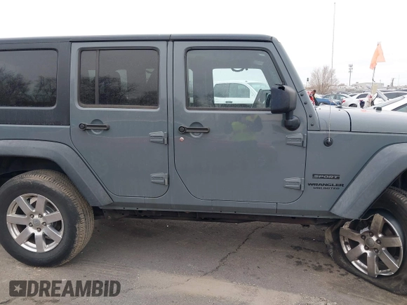 2014 Jeep Wrangler Unlimited Sport with VIN 1C4BJWDG4EL319259, listed as a IAAI auction lot 41494299 with 141,699 mi miles. Bid and sale history available at carsss.com. Image 13.