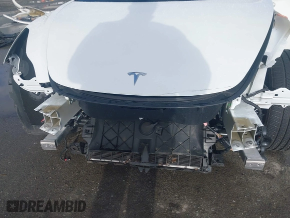 2021 Tesla Model 3 Long Range with VIN 5YJ3E1EB9MF055990, listed as a IAAI auction lot 41584065 with 49,147 mi miles and . Bid and sale history available at carsss.com. Image 6.