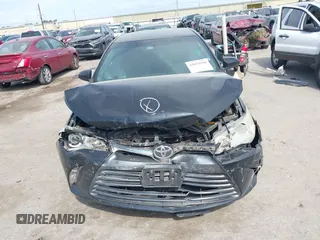 2015 Toyota Camry XLE with VIN 4T1BF1FK7FU037419, listed as a IAAI auction lot 42053259 with 118,453 mi miles and . Bid and sale history available at DreamBid. Image 12.