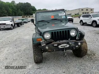 1999 Jeep Wrangler Sahara with VIN 1J4FY49S0XP489462, listed as a Copart auction lot 54750405 with 134,134 mi miles and Non repairable. Bid and sale history available at DreamBid. Image 13.