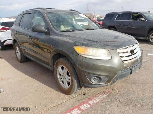 2012 Hyundai Santa Fe GLS with VIN 5XYZG3AB2CG128873, listed as a IAAI auction lot 41874808 with 182,453 mi miles. Bid and sale history available at carsss.com. Image 1.