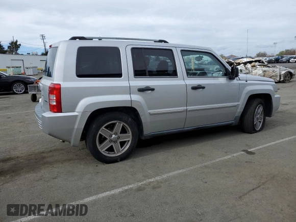 2008 Jeep Patriot Limited with VIN 1J8FT48W28D700911, listed as a Copart auction lot 47452615 with 152,602 mi miles and Salvage Title. Bid and sale history available at DreamBid. Image 3.