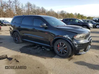 2018 Dodge Durango SRT with VIN 1C4SDJGJ0JC266264, listed as a Copart auction lot 47618075 with 64,723 mi miles and Salvage title. Bid and sale history available at DreamBid. Image 4.