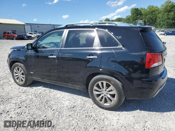 2012 Kia Sorento SX with VIN 5XYKWDA28CG300110, listed as a Copart auction lot 57994995 with 120,228 mi miles and Salvage title. Bid and sale history available at DreamBid. Image 2.
