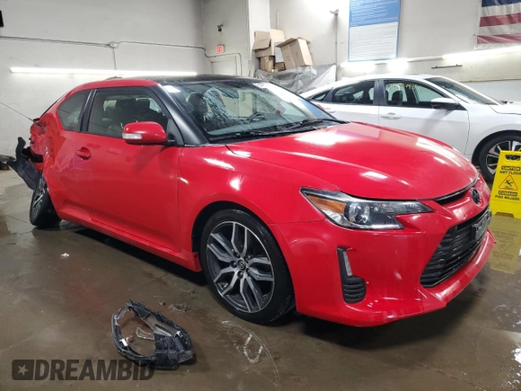 2014 Scion tC z VIN JTKJF5C71E3072025, wystawiony jako Copart lot #51967285 z przebiegiem 187 091 mil mil oraz Szkody całkowita. Historia ofert i sprzedaży dostępna na DreamBid. Obrazek 4.