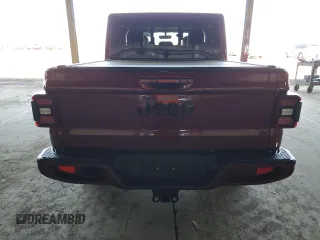 2021 Jeep Gladiator High Altitude with VIN 1C6HJTFG6ML535531, listed as a Copart auction lot 54349305 with 104,173 mi miles and Salvage title. Bid and sale history available at DreamBid. Image 6.