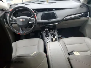 2023 Cadillac XT4 FWD Luxury with VIN 1GYAZAR45PF218684, listed as a Copart auction lot 46483515 with 74,920 mi miles and Salvage title. Bid and sale history available at DreamBid. Image 8.