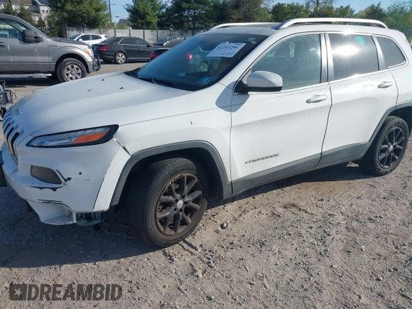 2015 Jeep Cherokee Latitude with VIN 1C4PJLCS6FW689607, listed as a IAAI auction lot 42103286 with 142,479 mi miles. Bid and sale history available at carsss.com. Image 18.