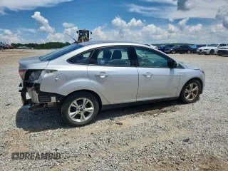 2013 Ford Focus SE with VIN 1FADP3F22DL323418, listed as a Copart auction lot 61859225 with 62,415 mi miles and Salvage title. Bid and sale history available at DreamBid. Image 3.