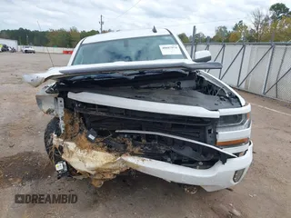 2018 Chevrolet Silverado 1500 LT with VIN 3GCUKREC3JG375591, listed as a IAAI auction lot 40887974 with 72,453 mi miles. Bid and sale history available at carsss.com. Image 11.