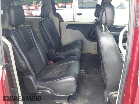 2014 Dodge Grand Caravan SXT with VIN 2C4RDGCG4ER366537, listed as a IAAI auction lot 42148032 with 126,531 mi miles and . Bid and sale history available at DreamBid. Image 8.