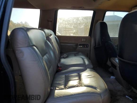 1994 Chevrolet Suburban with VIN 1GNFK16K0RJ417930, listed as a Copart auction lot 77583634 with 252,477 mi miles and Salvage Title. Bid and sale history available at carsss.com. Image 11.