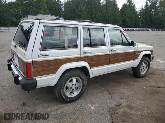 1990 Jeep Grand Wagoneer z VIN 1J4FN78L0LL282169, wystawiony jako Copart lot #59809545 z przebiegiem 194 382 mil mil oraz Czysty tytuł • Clean title. Historia ofert i sprzedaży dostępna na DreamBid. Obrazek 3.