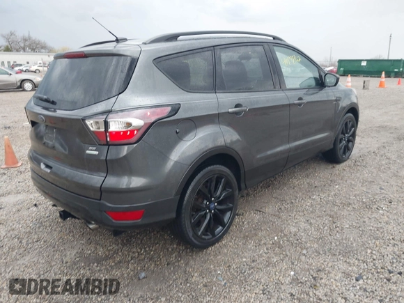 2017 Ford Escape SE with VIN 1FMCU0G97HUE53859, listed as a IAAI auction lot 41898162 with 79,619 mi miles. Bid and sale history available at carsss.com. Image 4.