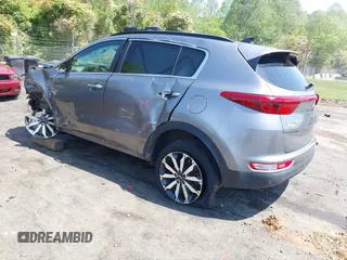 2018 Kia Sportage EX z VIN KNDPNCAC6J7401698, wystawiony jako IAAI lot #42071433 z przebiegiem 88 782 mil mil oraz . Historia ofert i sprzedaży dostępna na DreamBid. Obrazek 3.