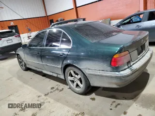 2000 BMW 5 Series 528iA with VIN WBADM6349YGU17950, listed as a Copart auction lot 84506464 with 209,318 mi miles and Salvage Title. Bid and sale history available at carsss.com. Image 2.