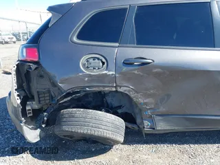 2019 Jeep Cherokee Latitude Plus with VIN 1C4PJLLB2KD438654, listed as a IAAI auction lot 41642098 with 69,678 mi miles and . Bid and sale history available at DreamBid. Image 6.