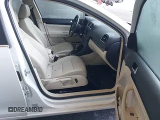 2012 Volkswagen Jetta TDI w/Sunroof & Nav z VIN 3VWPL7AJ7CM698031, wystawiony jako IAAI lot #41077477 z przebiegiem 126 351 mil mil oraz . Historia ofert i sprzedaży dostępna na DreamBid. Obrazek 5.