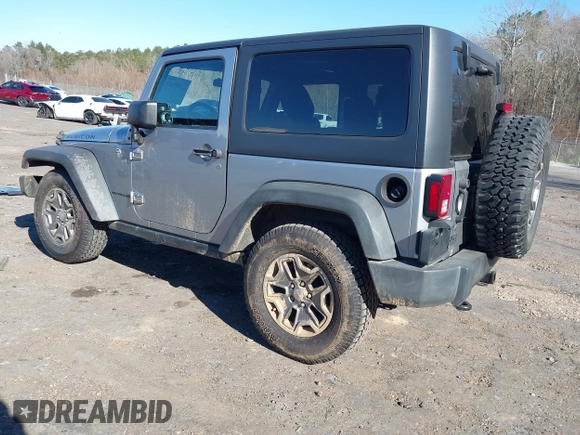 2016 Jeep Wrangler Rubicon z VIN 1C4BJWCGXGL307542, wystawiony jako IAAI lot #41407411 z przebiegiem 124 749 mil mil oraz . Historia ofert i sprzedaży dostępna na DreamBid. Obrazek 3.
