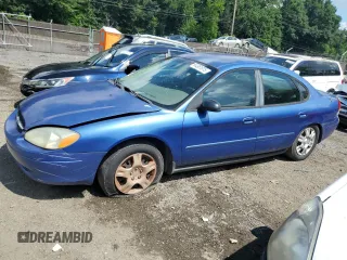 2003 Ford Taurus LX Standard with VIN 1FAFP52U03A126415, listed as a Copart auction lot 64361675 with 203,223 mi miles and Salvage title. Bid and sale history available at DreamBid. Image 1.