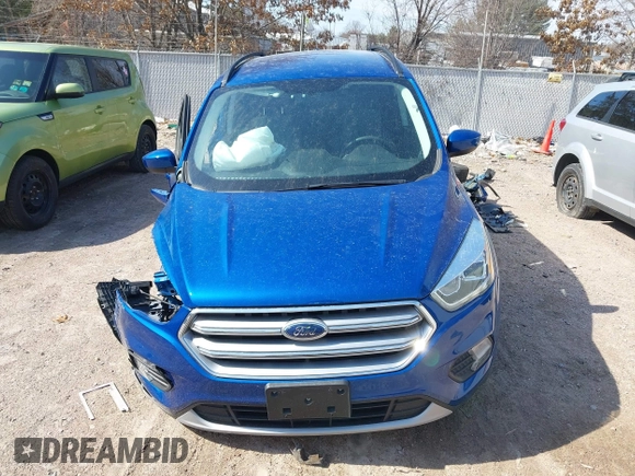 2017 Ford Escape SE z VIN 1FMCU0G95HUB75348, wystawiony jako IAAI lot #41790288 z przebiegiem 55 129 mil mil oraz . Historia ofert i sprzedaży dostępna na DreamBid. Obrazek 12.