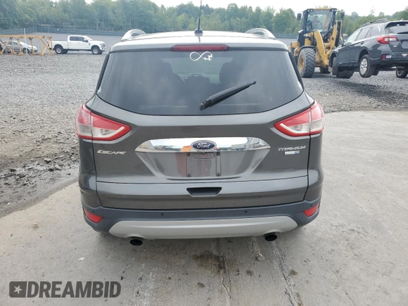 2016 Ford Escape Titanium with VIN 1FMCU9J90GUA01974, listed as a Copart auction lot 60376265 with 177,384 mi miles and Salvage title. Bid and sale history available at DreamBid. Image 6.