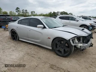 2019 Dodge Charger Scat Pack with VIN 2C3CDXGJ0KH688805, listed as a Copart auction lot 50822835 with 71,827 mi miles and Salvage Title. Bid and sale history available at DreamBid. Image 4.