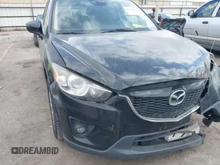 2015 Mazda CX-5 Grand Touring with VIN JM3KE2DY2F0541704, listed as a IAAI auction lot 41515010 with 175,912 mi miles. Bid and sale history available at carsss.com. Image 1.