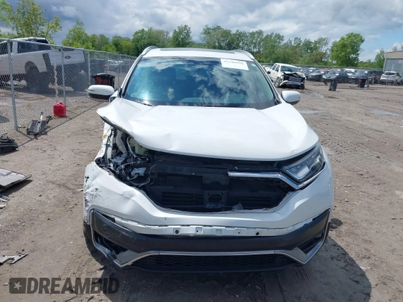 2020 Honda CR-V Touring z VIN 2HKRW2H97LH676151, wystawiony jako IAAI lot #42340956 z przebiegiem 32 492 mil mil oraz . Historia ofert i sprzedaży dostępna na DreamBid. Obrazek 12.