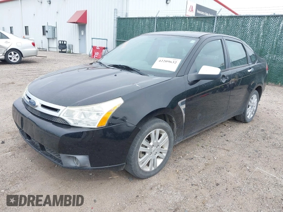 2008 Ford Focus SE z VIN 1FAHP35N88W201941, wystawiony jako IAAI lot #42209632 z przebiegiem 115 901 mil mil oraz . Historia ofert i sprzedaży dostępna na DreamBid. Obrazek 2.